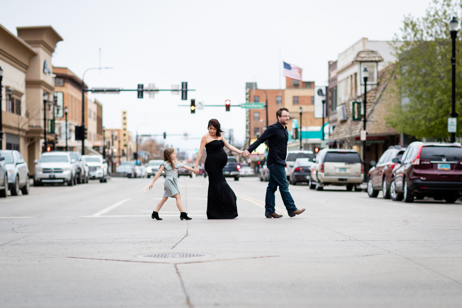 Family walking across Main Street