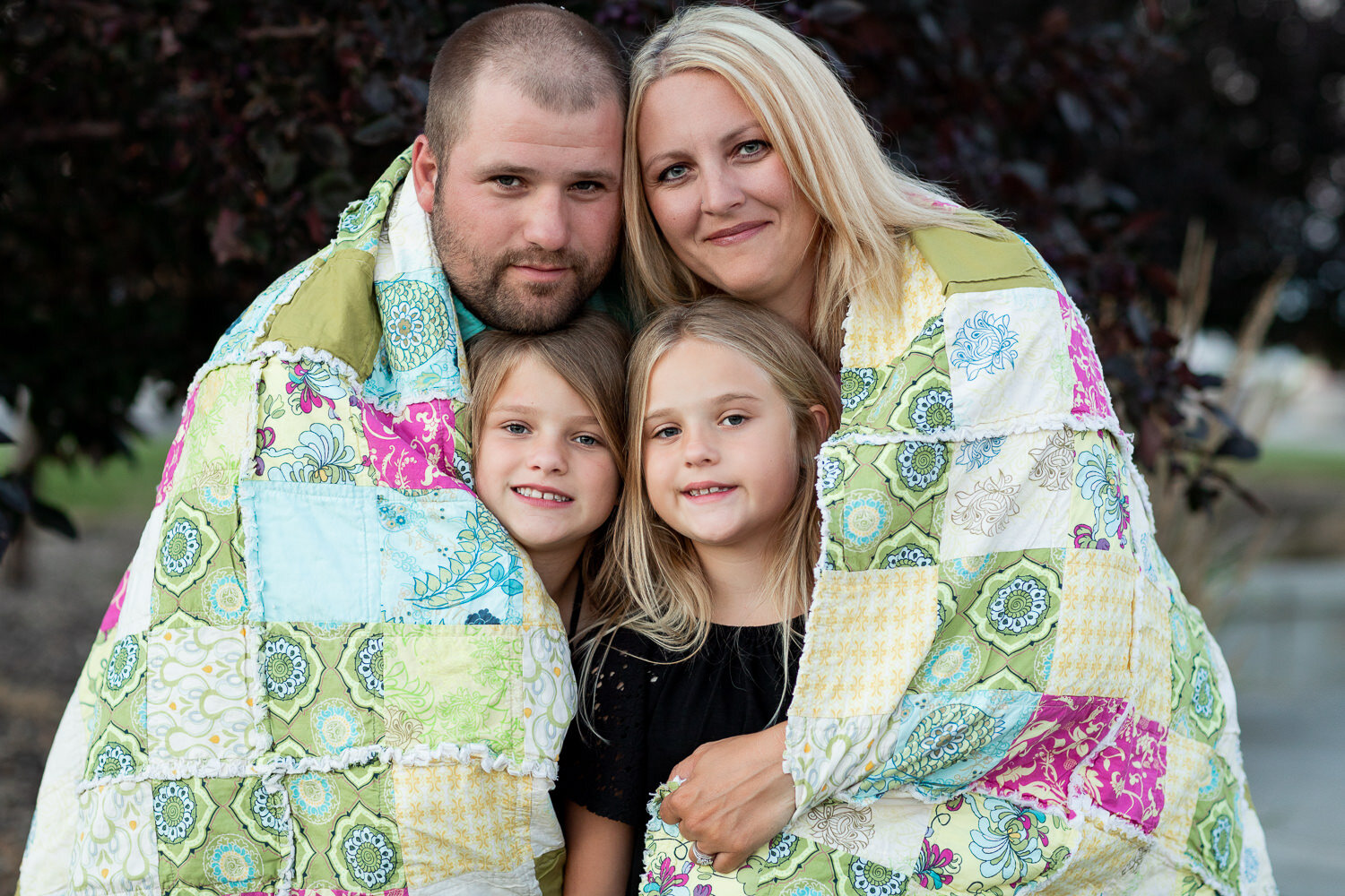 Austreim family in a blanket 