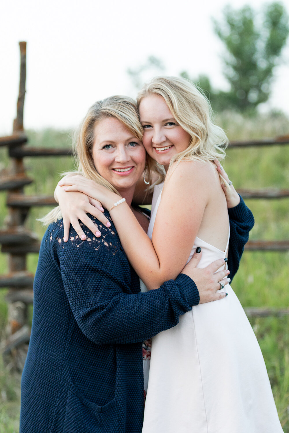 mom and daughter embracing