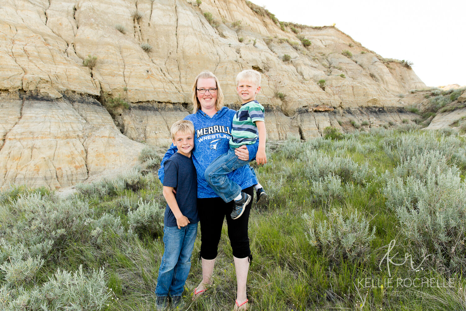 mom with two sons in badlands