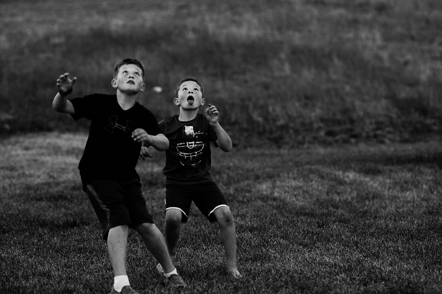 brothers watching for football black and white photograph- Williston family photographer