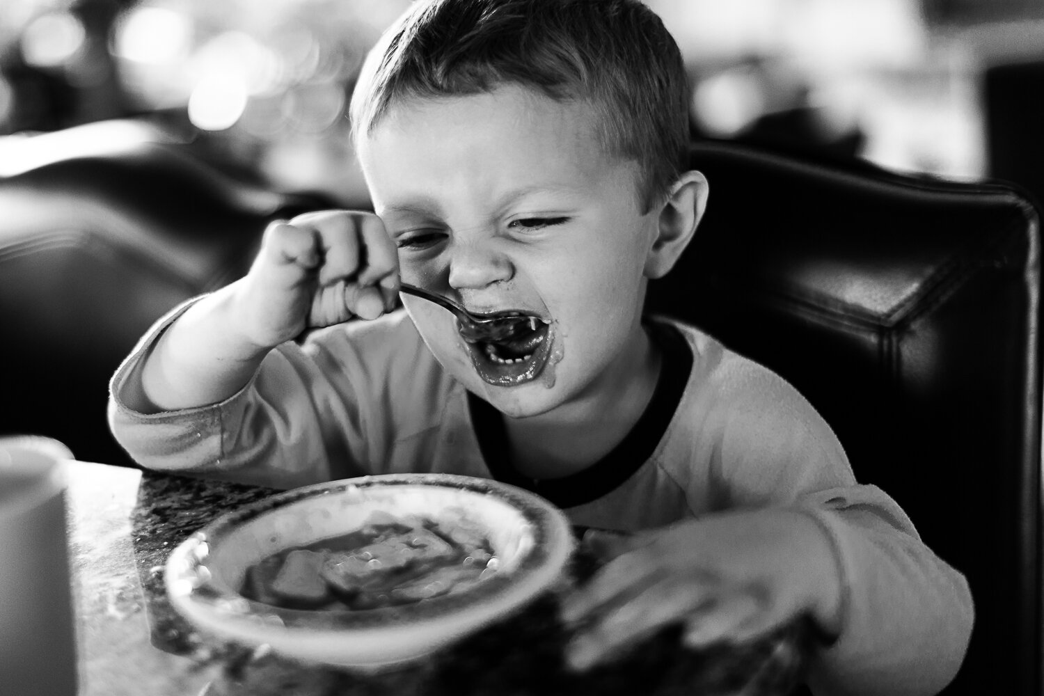 Big bite of soup- little boy - Williston children photographer
