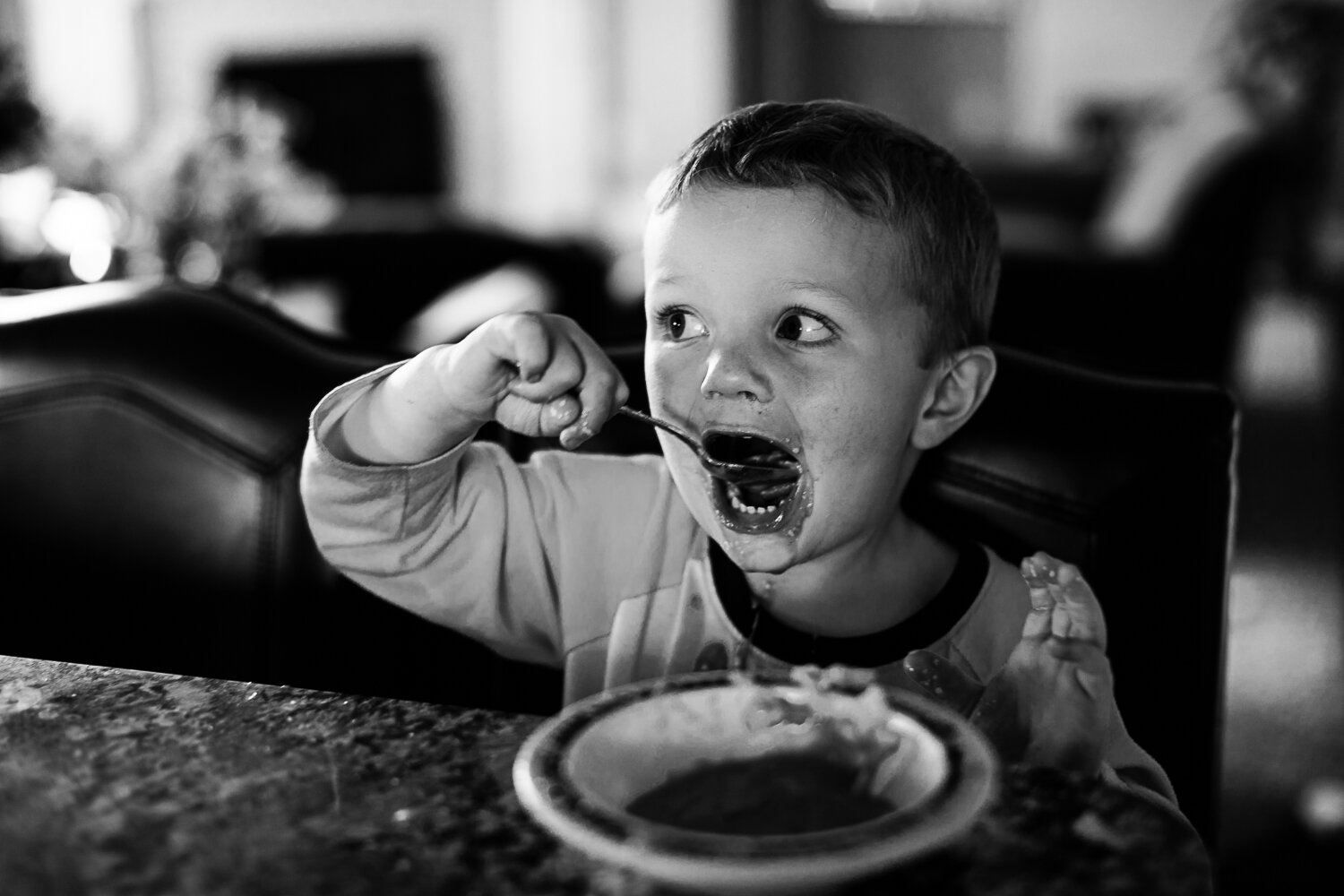 big bite of tomato soup toddler boy- Williston family photographer