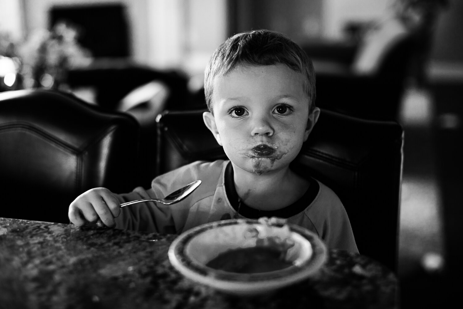 big mouthful of tomato soup black and white image- Williston portrait photographer
