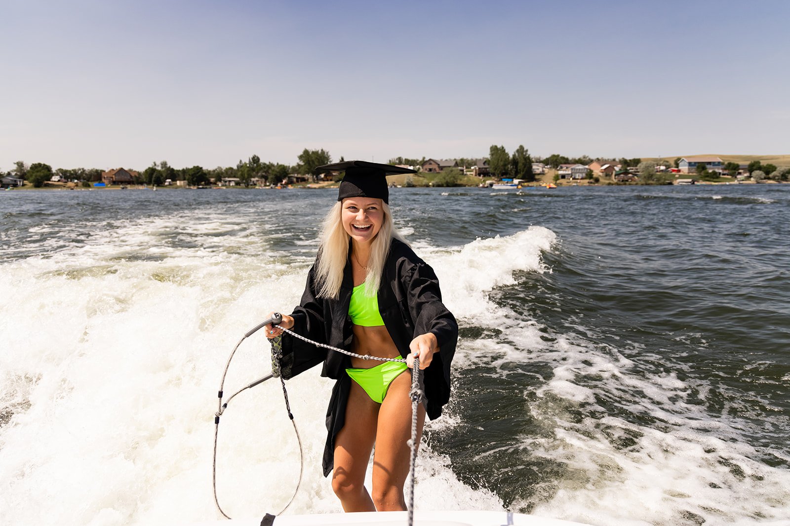 senior session wakeboarding on the lake