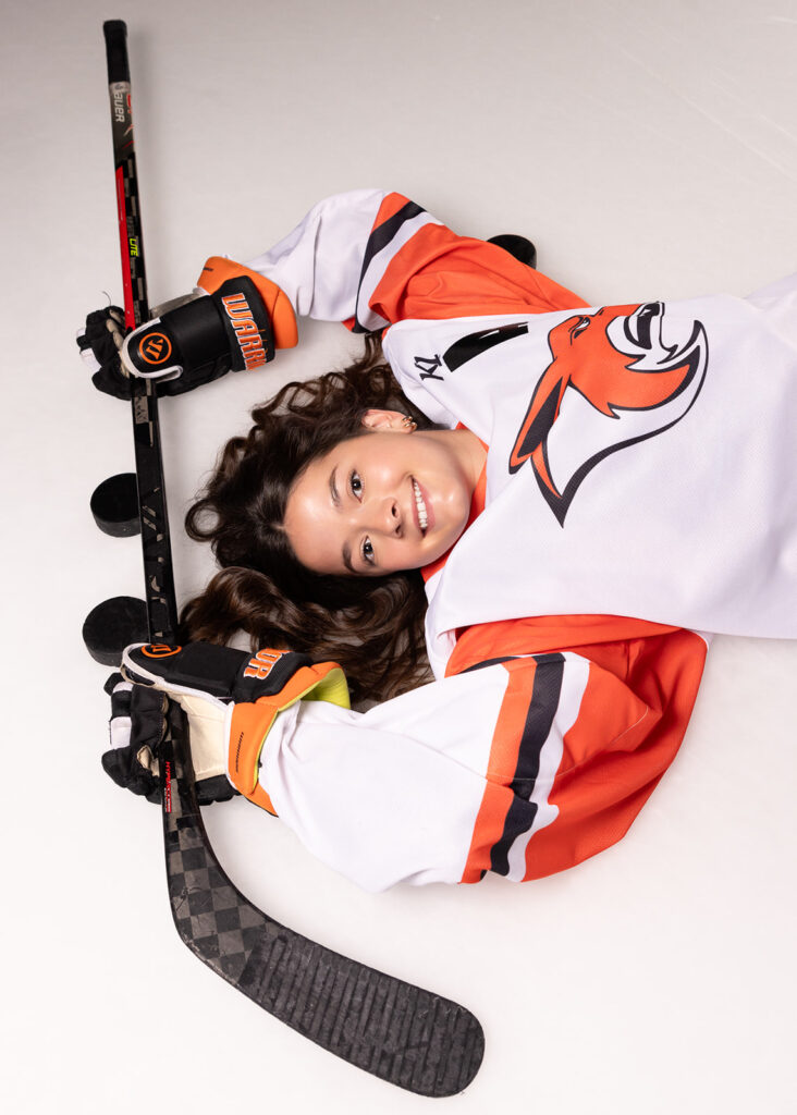 North Dakota hockey senior photo is displayed during a photoshoot with Kellie Rochelle Photography.