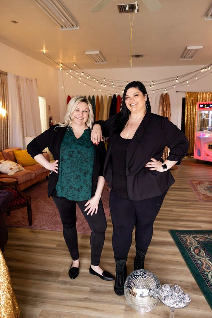 North Dakota event planners, House of Style, are pictured showcasing their claw machine in their Williston, ND building during a women owned business branding photoshoot with Kellie Rochelle Photography.