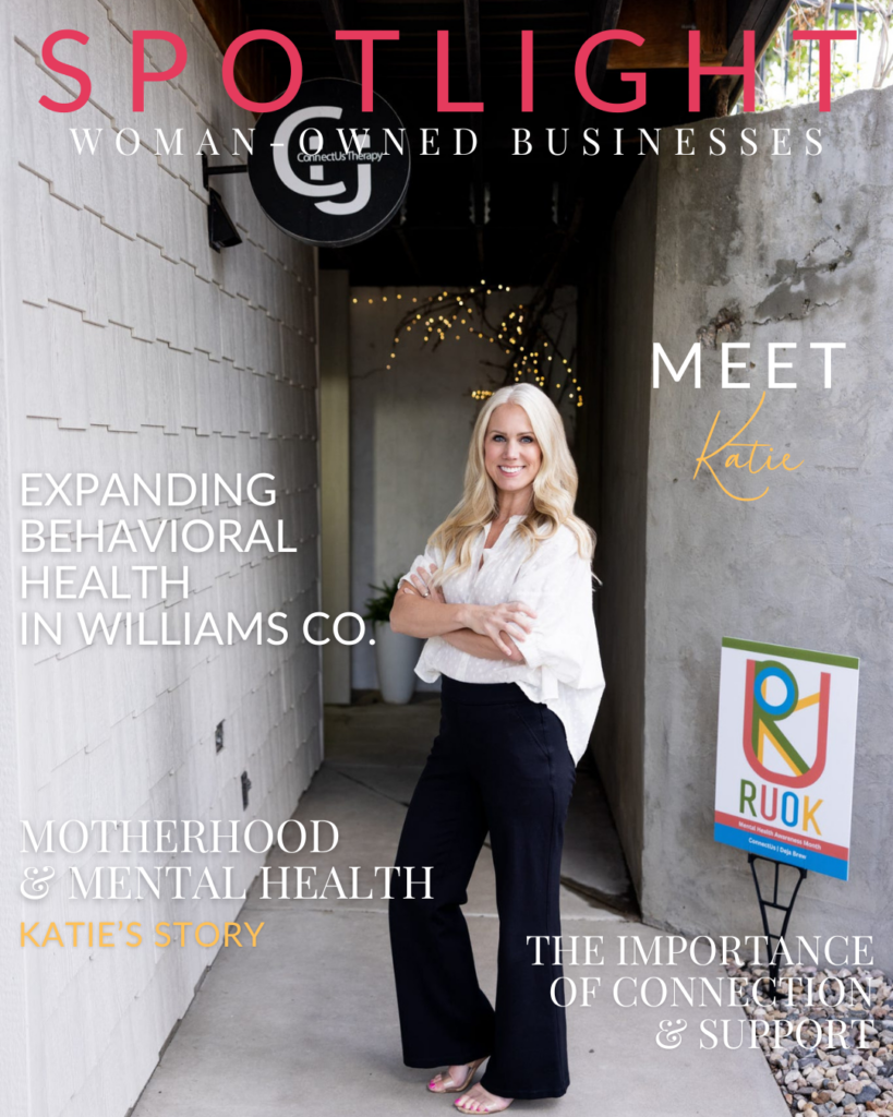 Katie Shannon, founder of Williston mental health practice, ConnectUs Therapy, is photographed next to the sign at the front of her business wearing a white, flowy blouse and professional black pants during a branding photoshoot with Kellie Rochelle Photography.