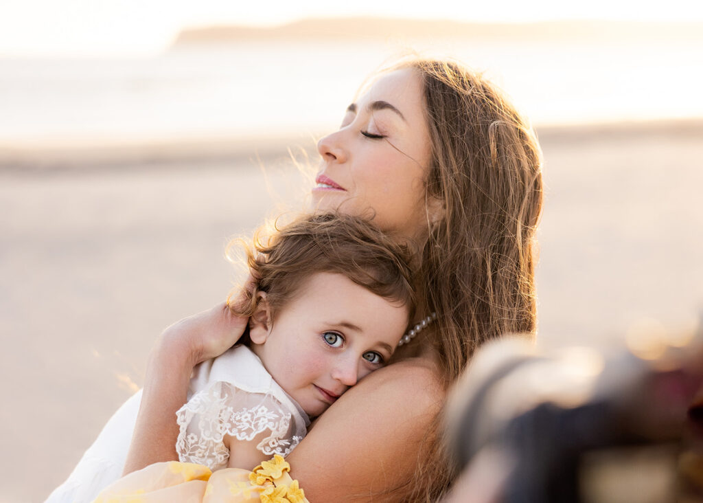 Family photos taken on a California beach by Kellie Rochelle Photography as part of a photography education retreat