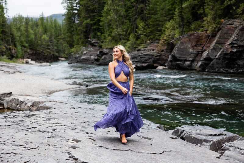 senior walking on the rocks by the river - converting your website traffic into sales