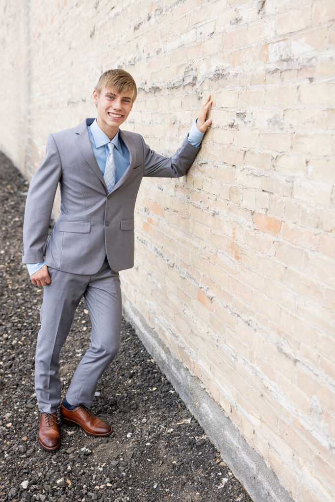 Grady downtown in Williston for adventure senior session photos with urban vibe