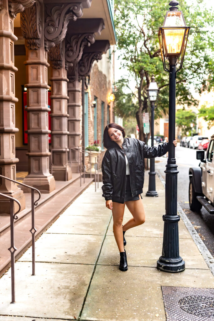Bold senior portraits with texture and movement on Charleston’s Chalmers Street
