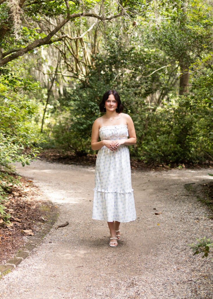Magnolia’s dreamy garden paths used in Charleston senior session
