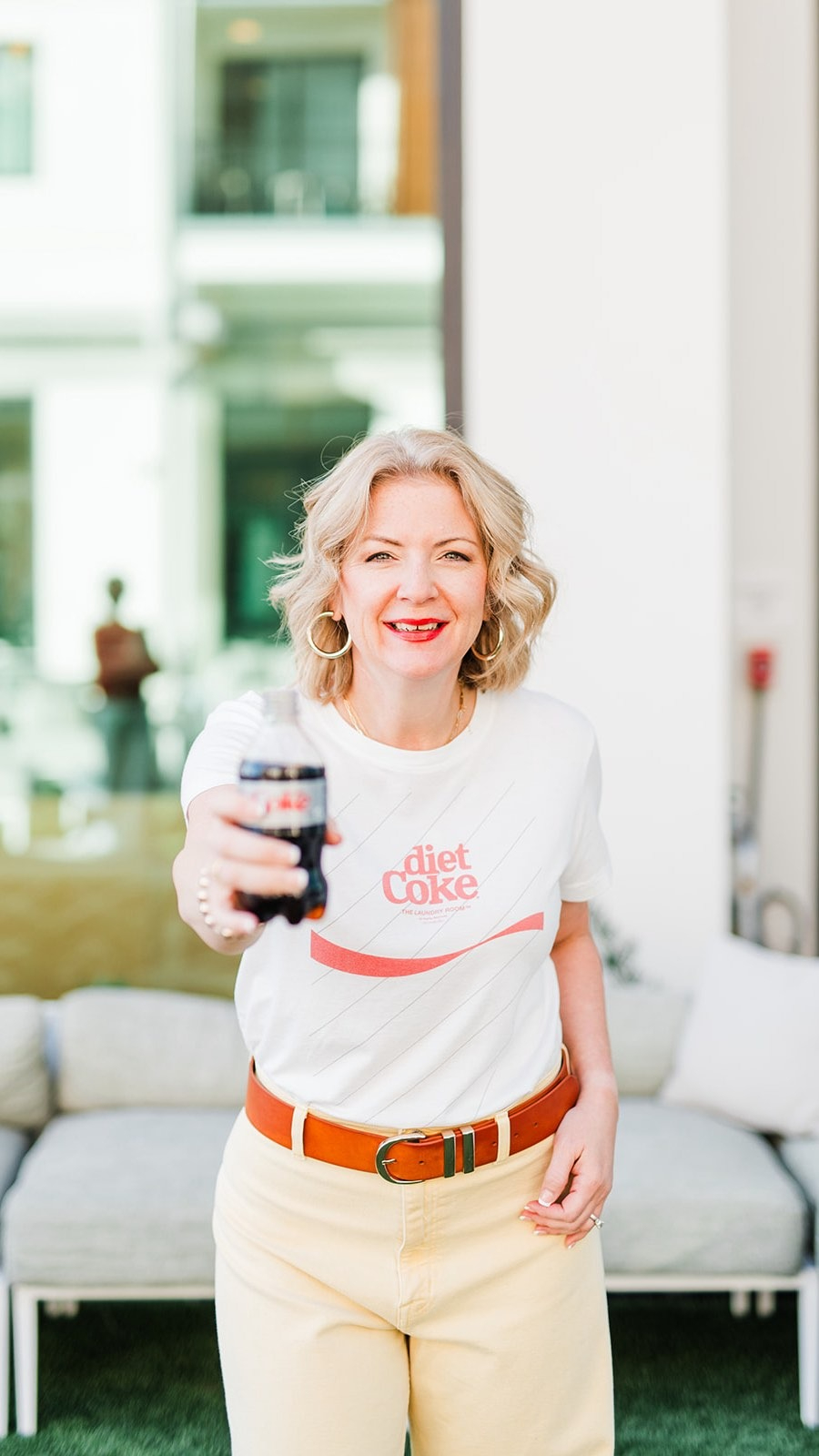 photgrapher mentor and educator holding a diet coke teaching about slow business growth