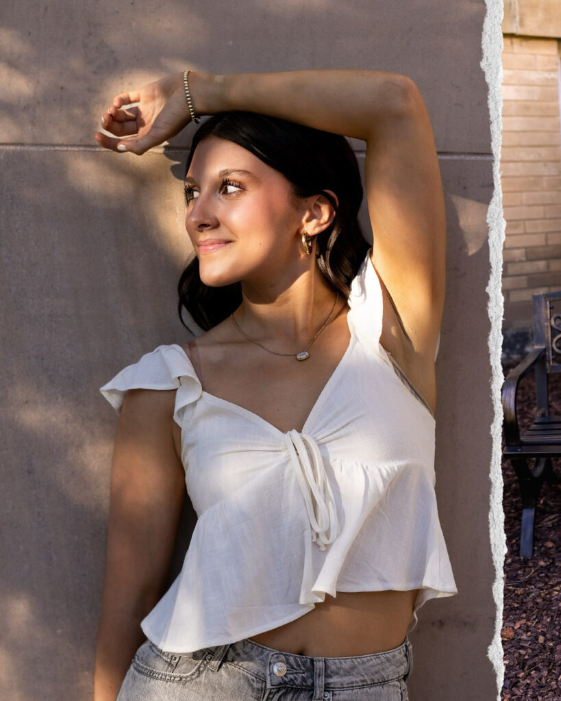 Portrait of a woman smiling in golden hour light, representing confidence in what is scaling your business.