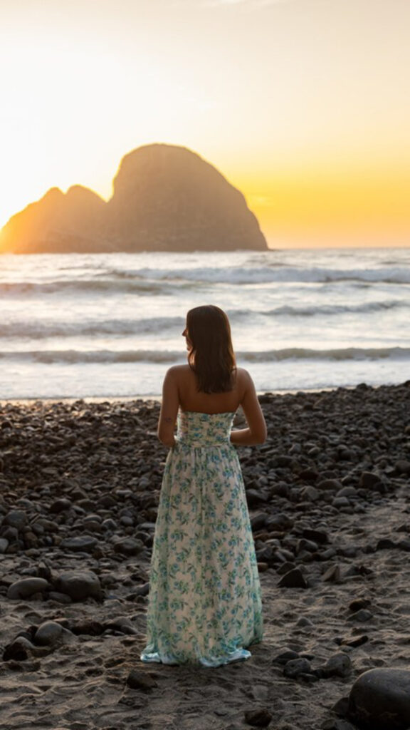 Woman in floral dress at sunset beach session—ideal for editing faster without compromising style.
