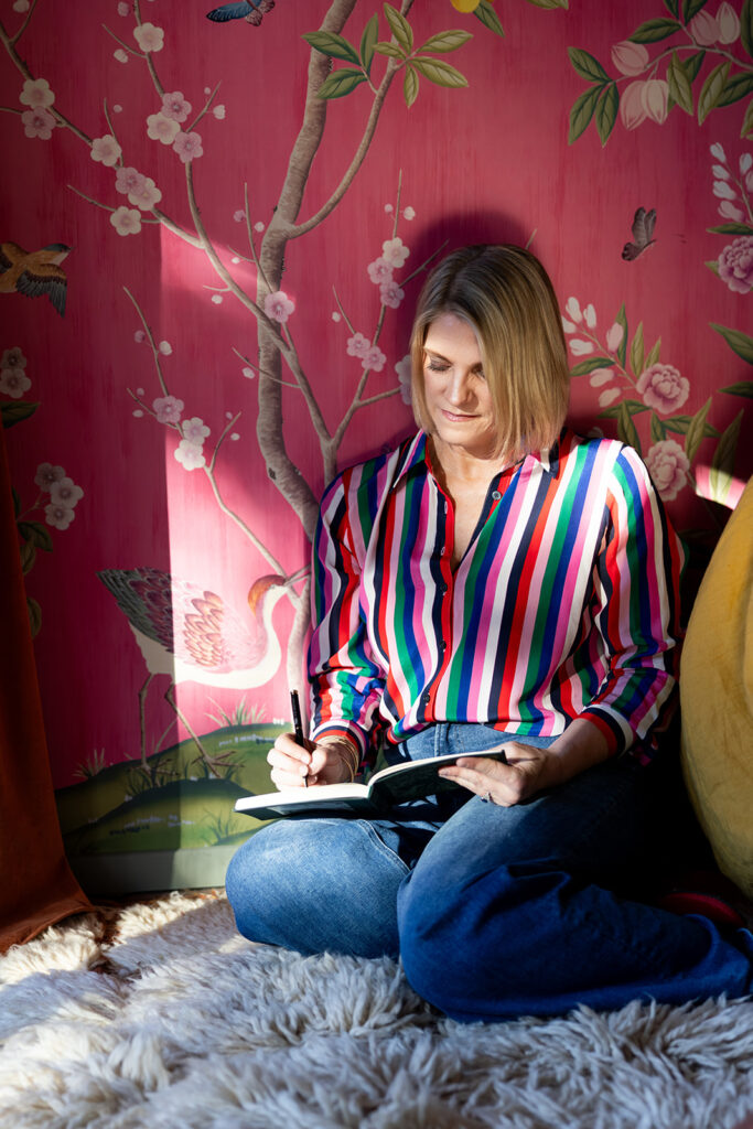 A photographer writes in a planner in this Palm Springs photo session 