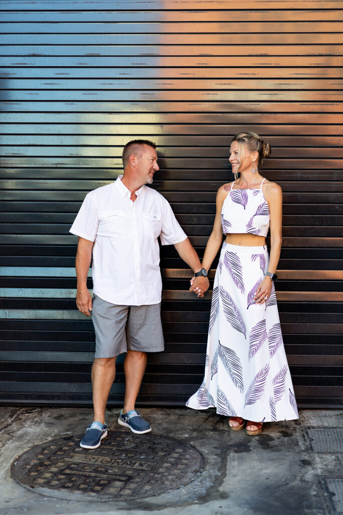 A couple holds hands during a weekend getaway during a nashville tn photography session