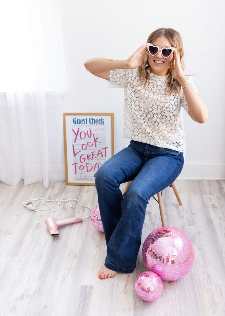 North Dakota cosmetology student Isabel posing in a natural light studio during her branding session