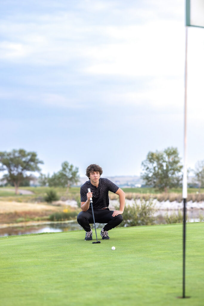 Trygve Zunich on the green during his golf senior session